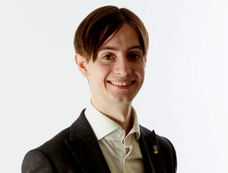 Dr. Elliott Lancaster MBE